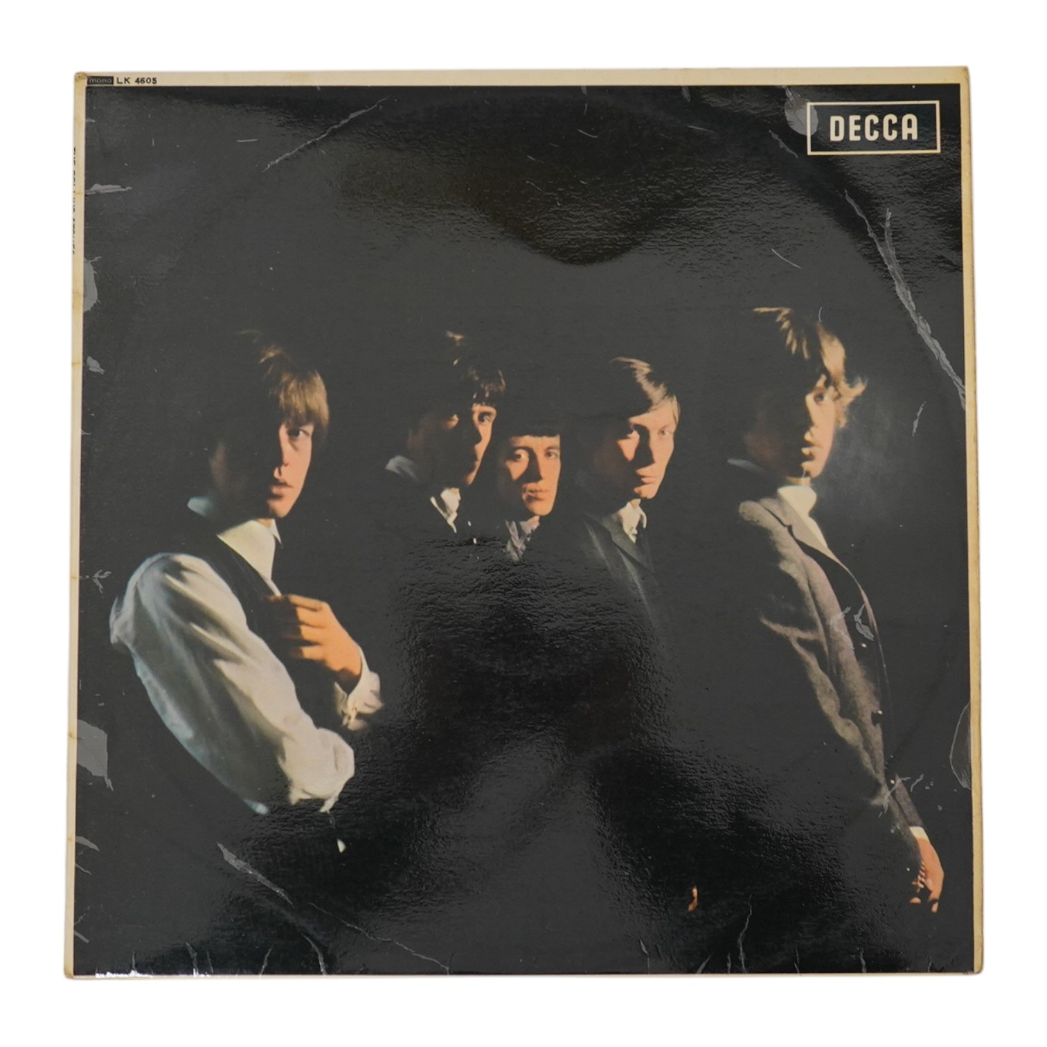 The Rolling Stones, first LP record album, on red Decca label, LK.4605, XARL-6271-1A XARL-6272-3A. Condition - fair to good, some surface scratches and general wear to the cover.